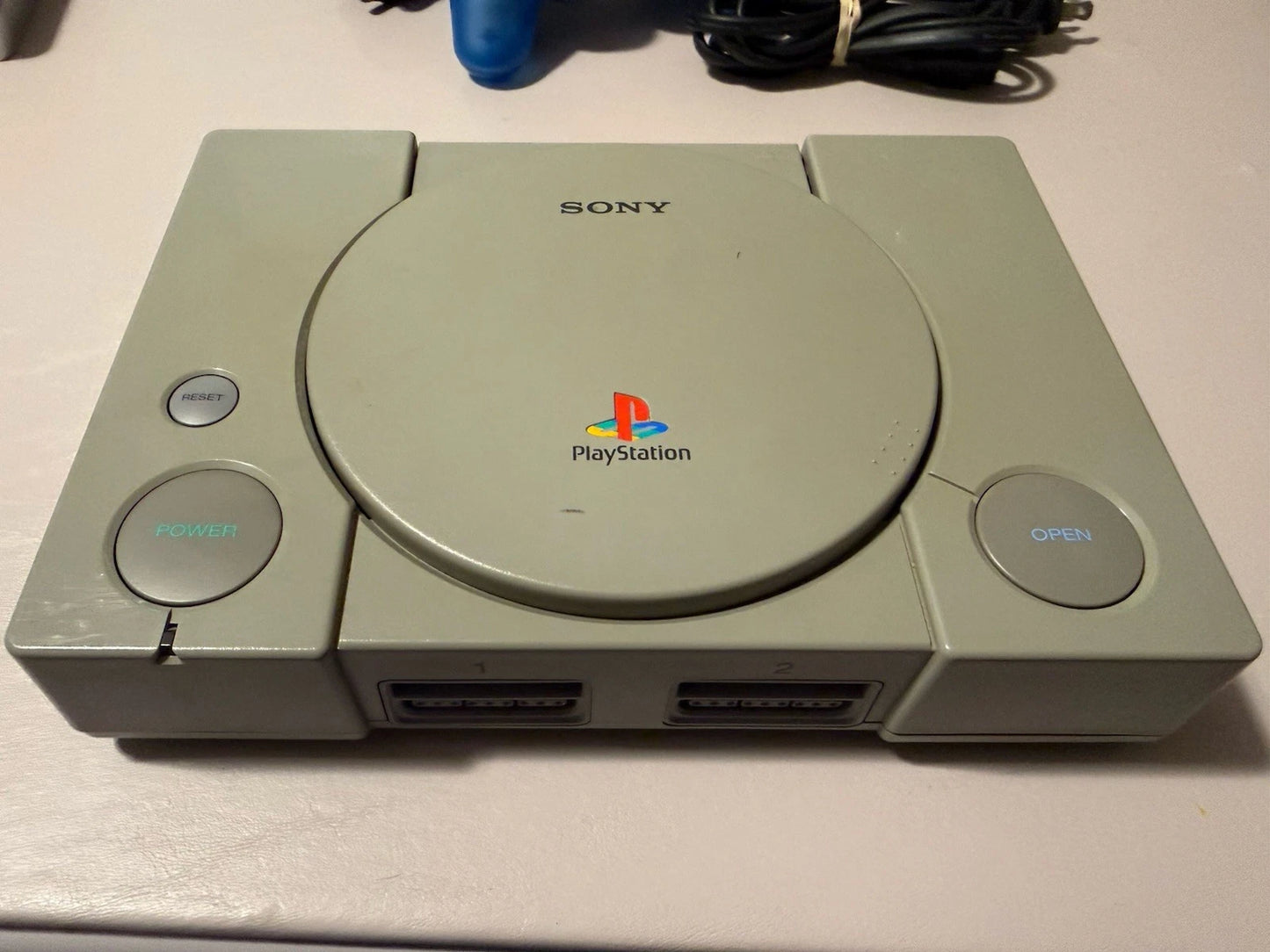 Playstation W/Clear Blue Controller