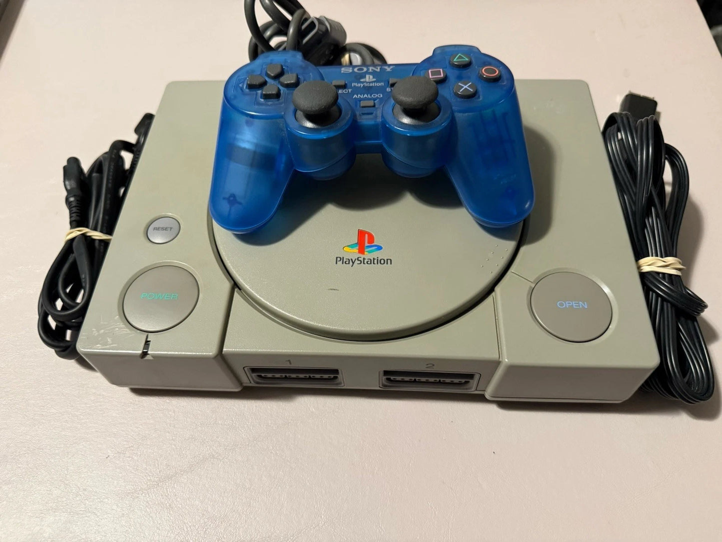 Playstation W/Clear Blue Controller